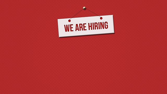 hiring sign in red